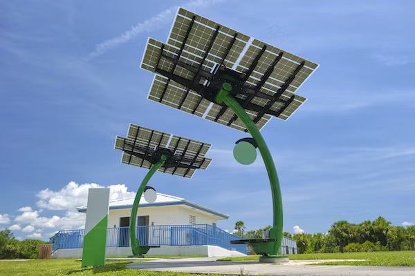 Solar panels mounted on a city street pole.